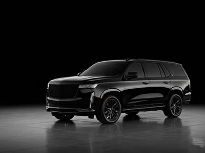 Passenger enjoying premium black car service inside a luxury executive GMC Yukon Denali SUV in Edmonton